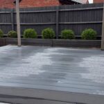clean and wet decking after pressure washing
