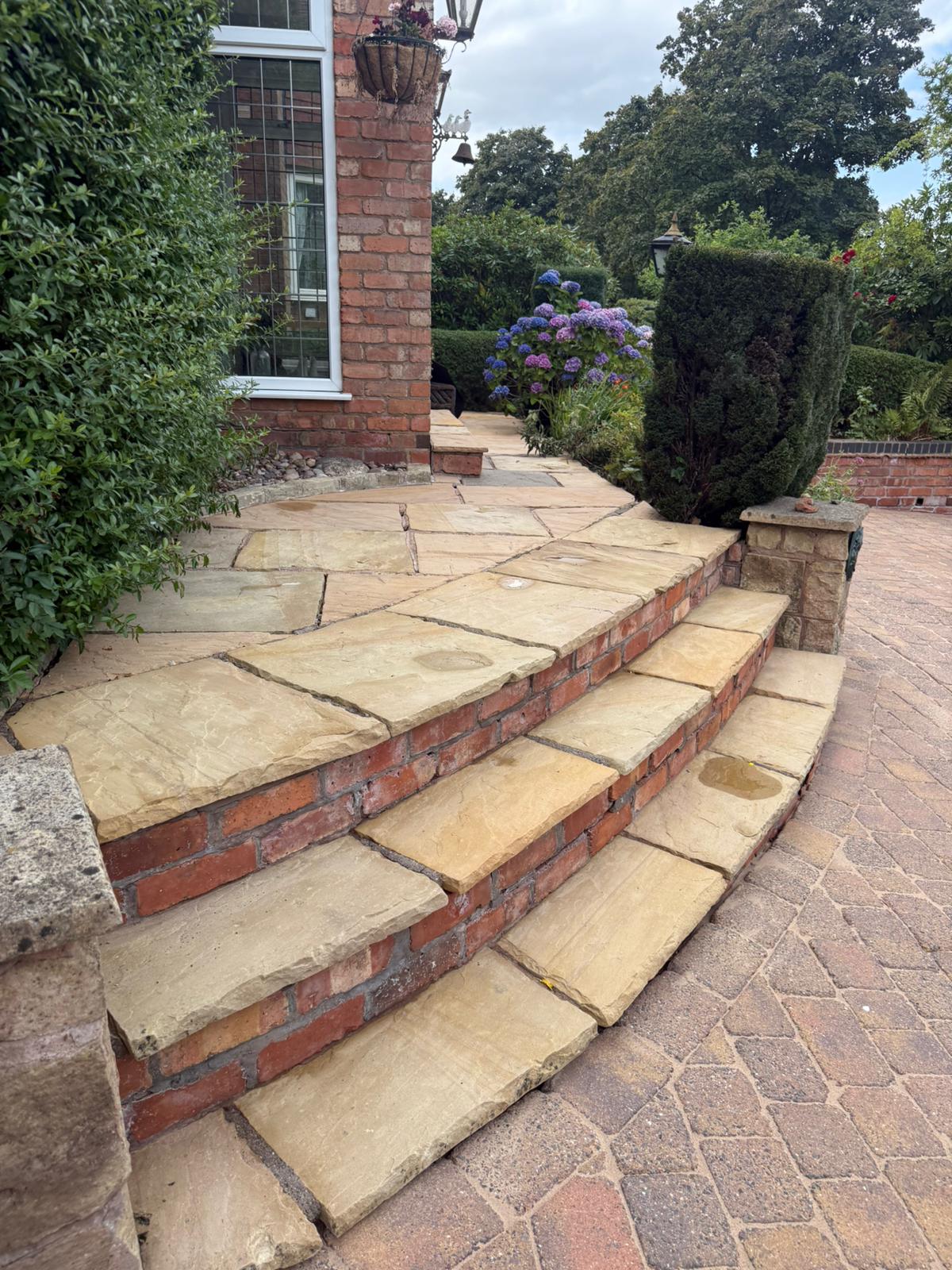 slabs steps up to house after pressure wash