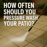 how often should you pressure wash your patio featued image of garden patio being pressure washed and cleaned